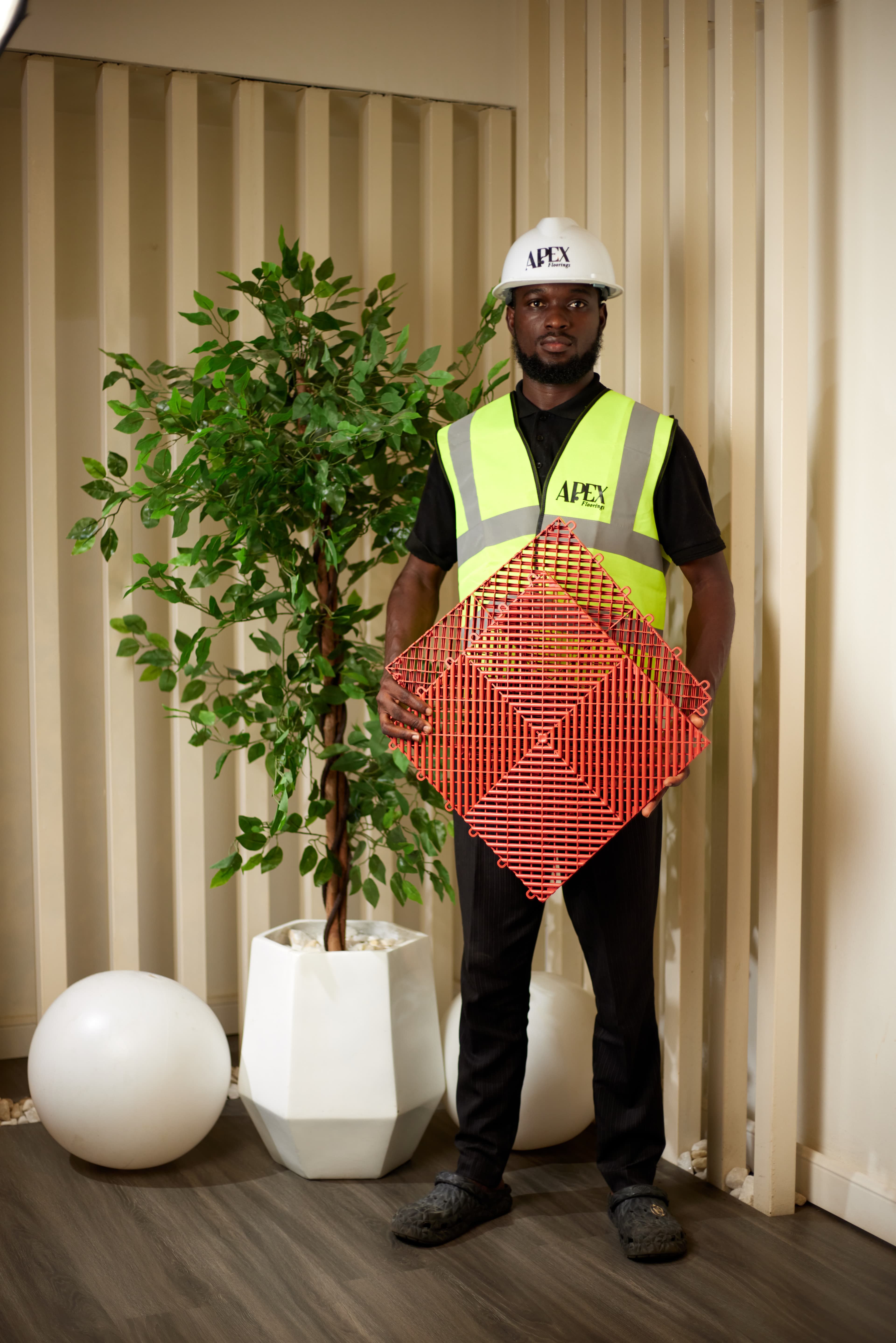 Apex team member holding red Terra tile