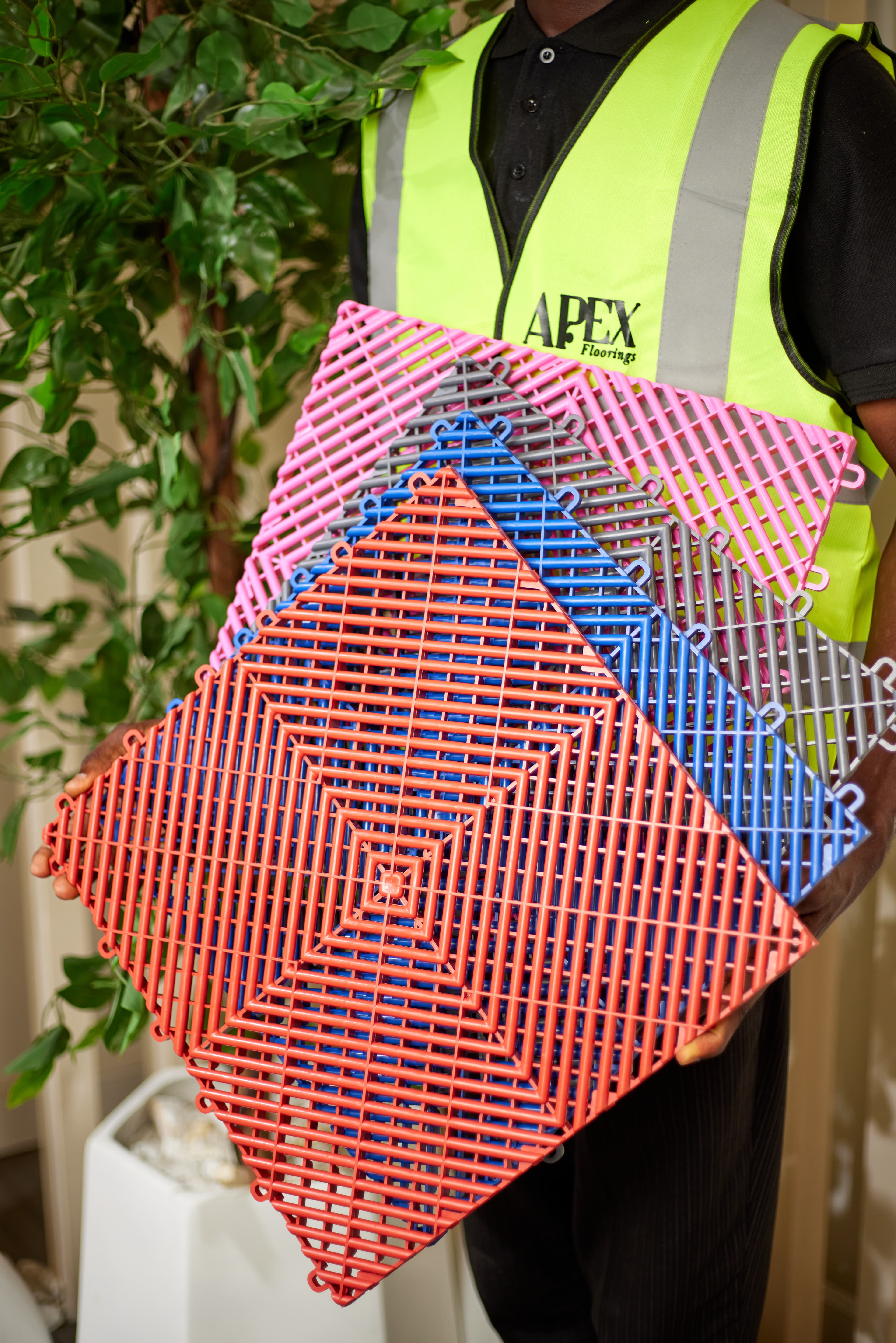 Holding fan of multicolour interlocking tiles